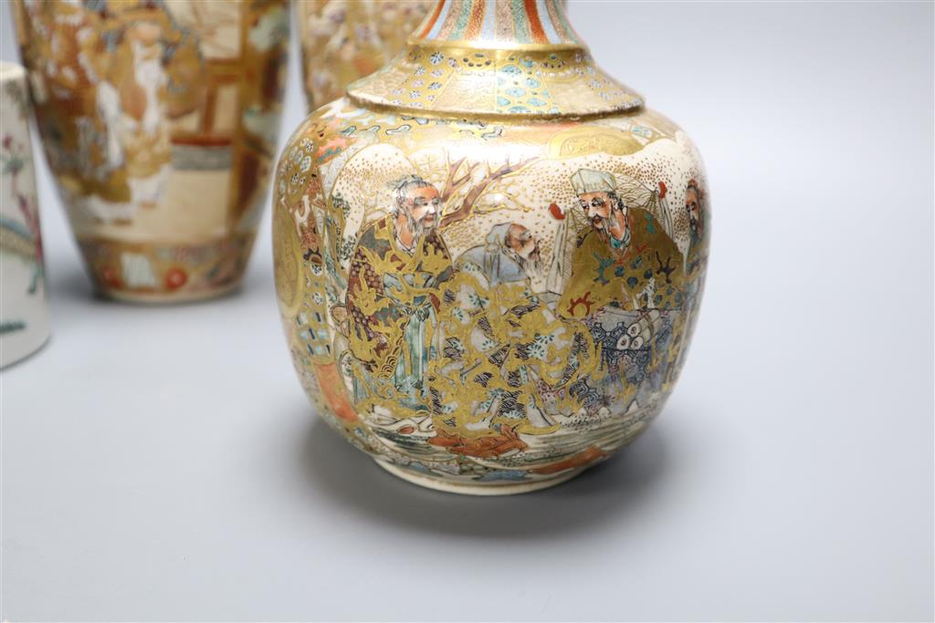 Three Japanese Satsuma vases and a Chinese jar, tallest 24cm